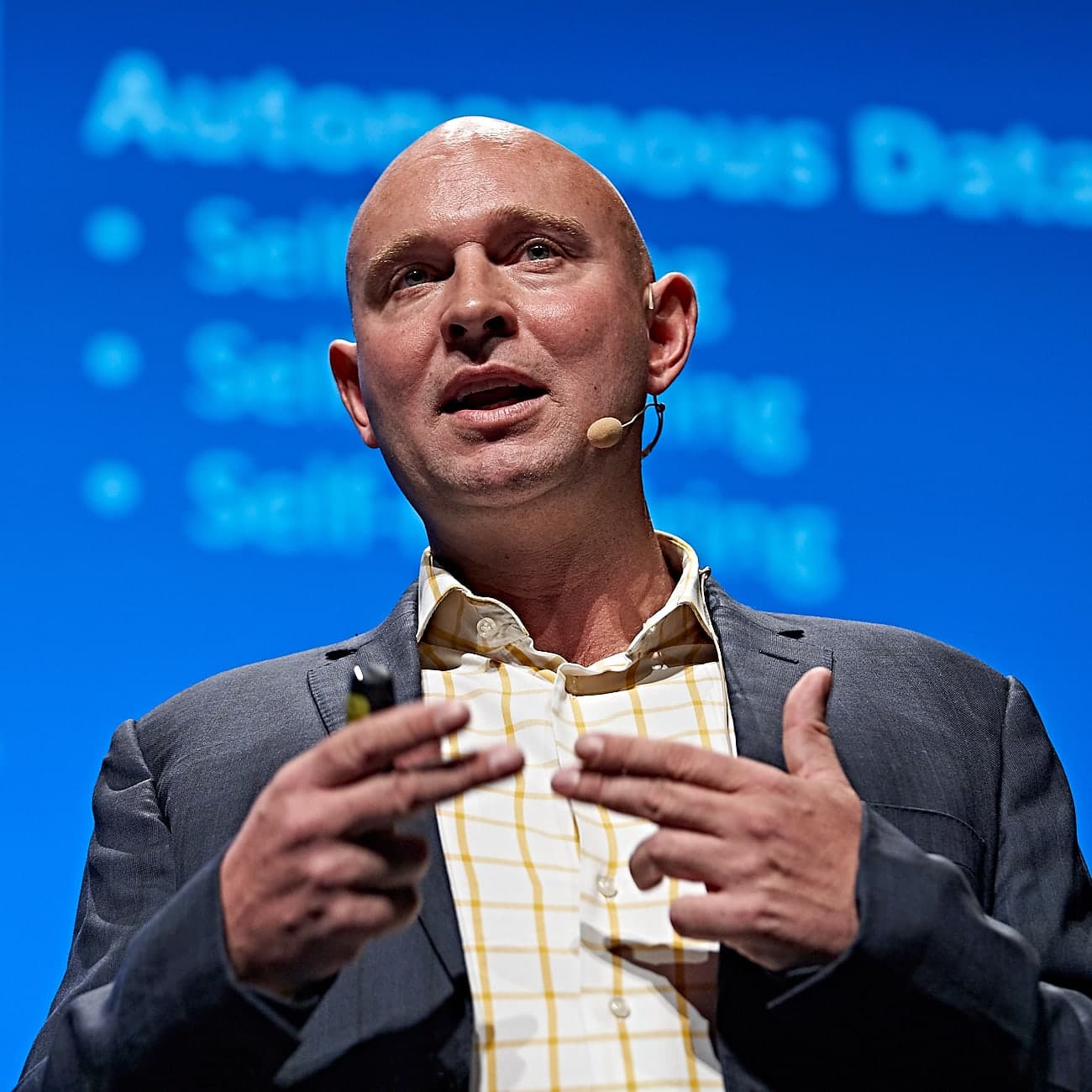 Michael Scheelhardt speaking at the AI Summit in Melbourne.